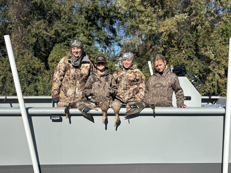 A group riding out along the rail before shooting light